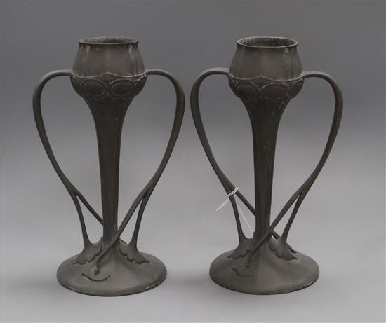 Archibald Knox - a pair of Tudric tulip-shaped double handled vases height 25cm